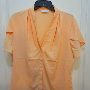 Brand New Calvin Klein Orange Vneck Blouse.